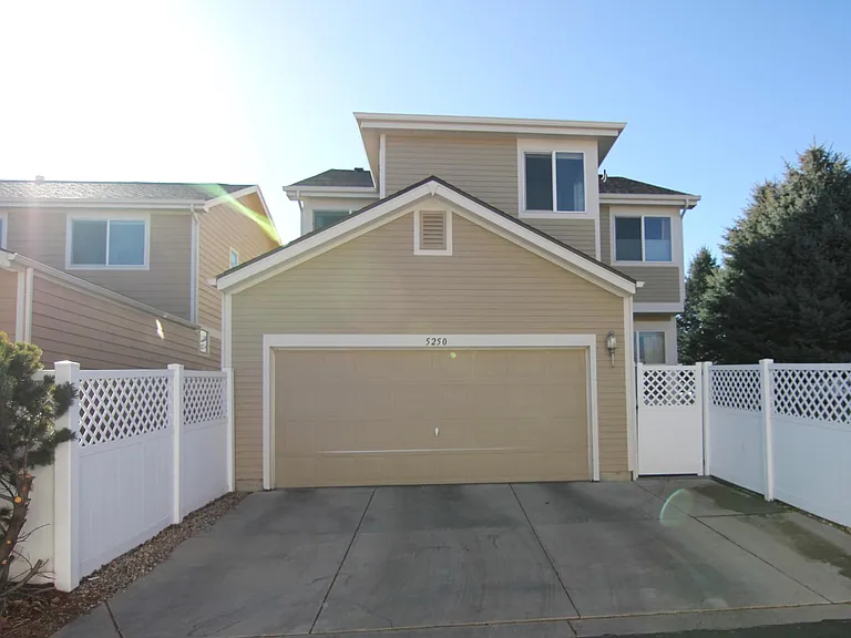 Rear loading attached 2 car garage