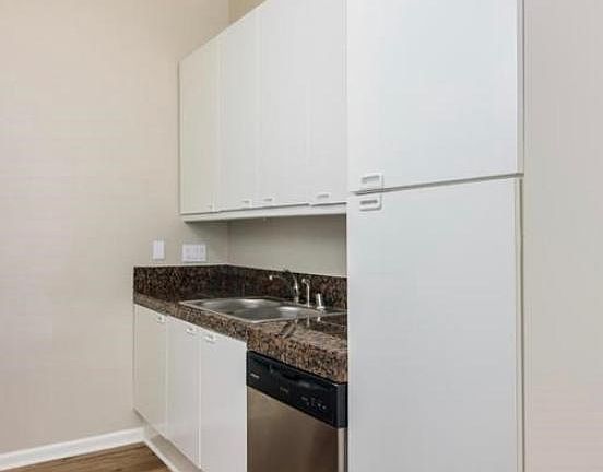 Other side of kitchen with Large Pantry