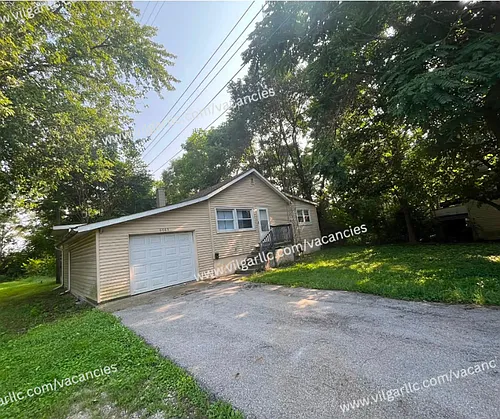 6065 E 6th Pl Photo 1