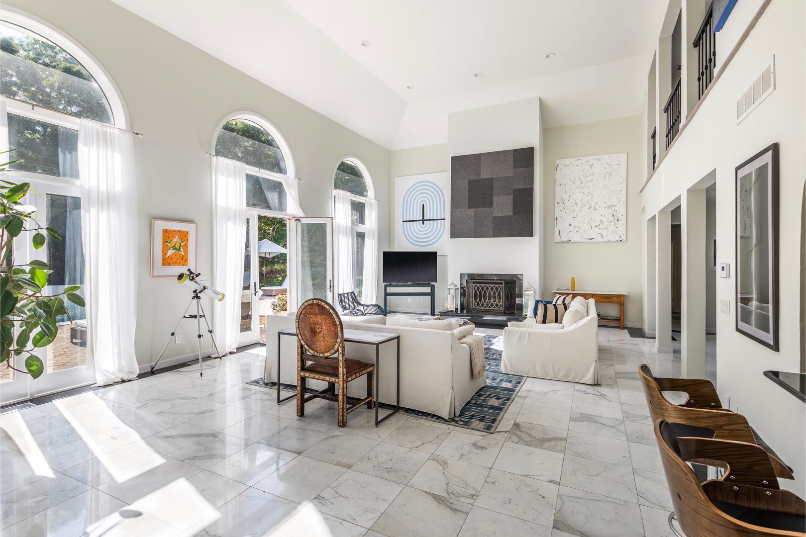  Living Room, outfitted with Restoration Hardware lounge furniture. SmartTV equipped. 