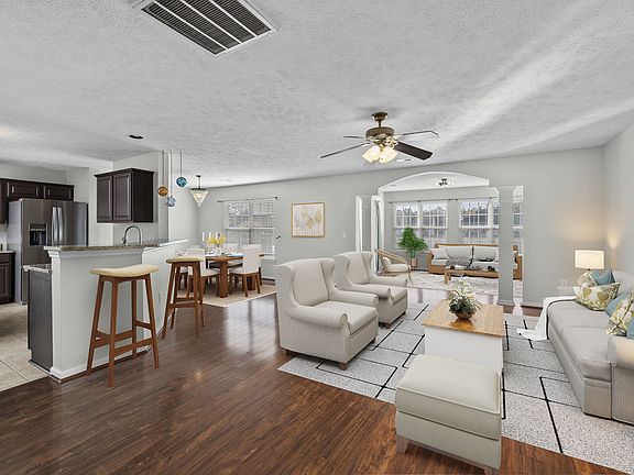 Open floor plan with so much flexibility (virtually staged)