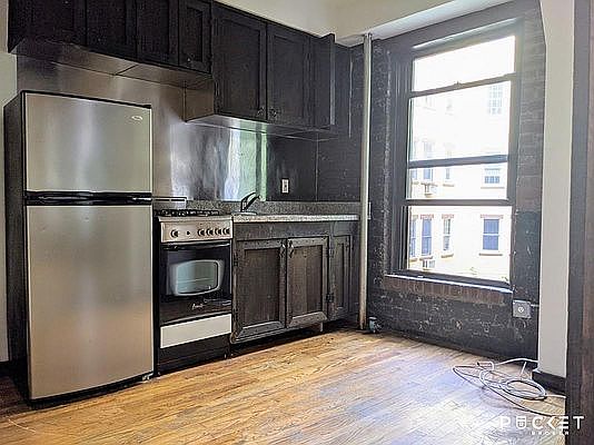 1st image of 413 E 12th St APT 7