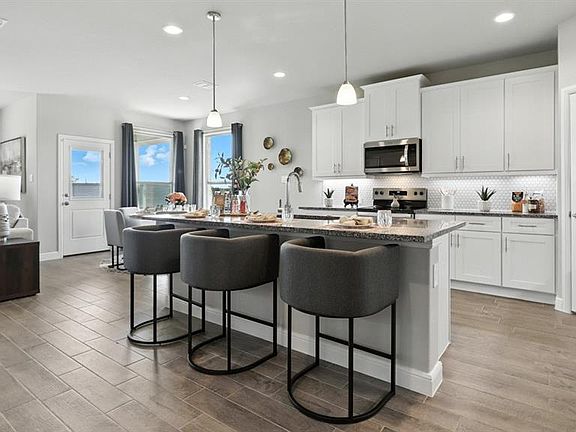 Kitchen- All Home and community information, including pricing, included features, terms, availability and amenities, are subject to change at any time without notice or obligation. All Drawings, pictures, photographs, video, square footages, floor plans, elevations, features, colors and sizes are approximate for illustration purposes only and will vary from the homes as built.