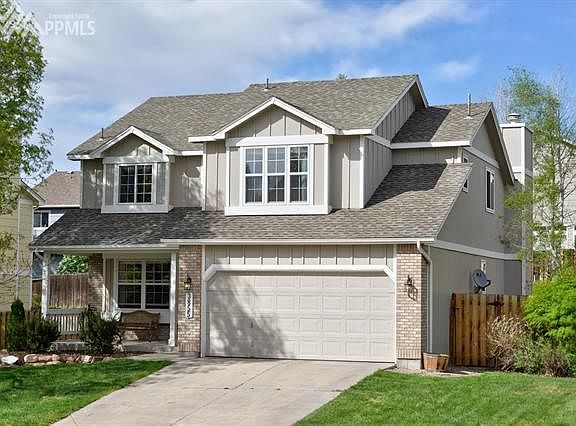 The front porch invites you to sit and enjoy this quiet neighborhood