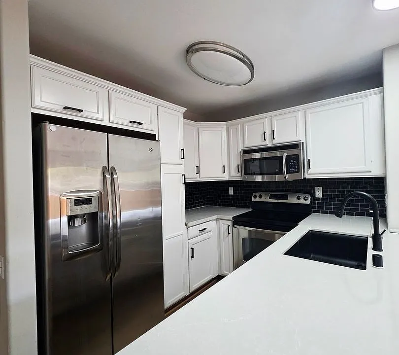 5252 Balboa Arms Dr #203