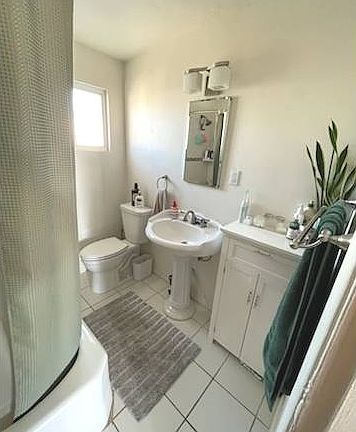 Upgraded 4 piece bath (tub, shower, toilet, sink)