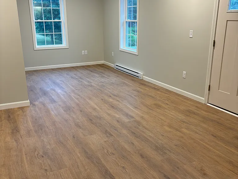 living area adjacent to the kitchen/dining area
