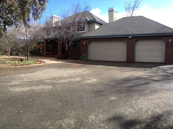 Front,3 car w/1/2 bath 