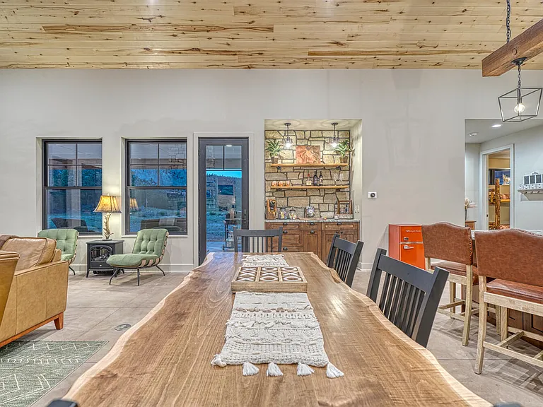 This custom plank table will seat at least 8 and is a nice spot to work on a puzzle or play a board game.