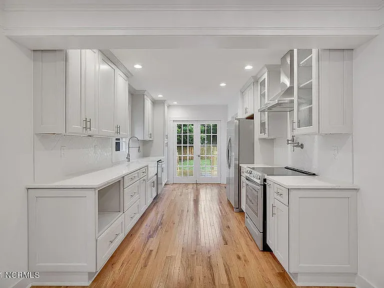 *original listing photo from when we purchased the home (kitchen)