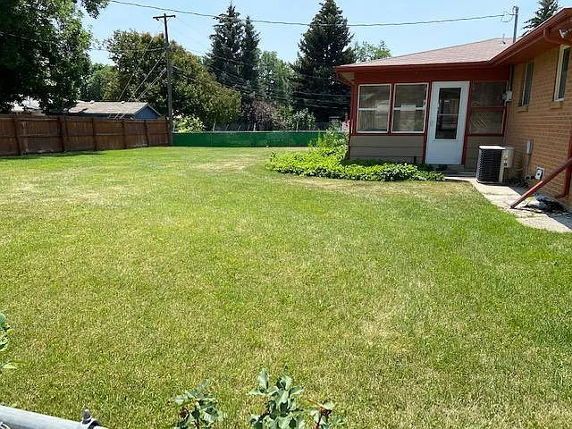 Large backyard, and sunroom