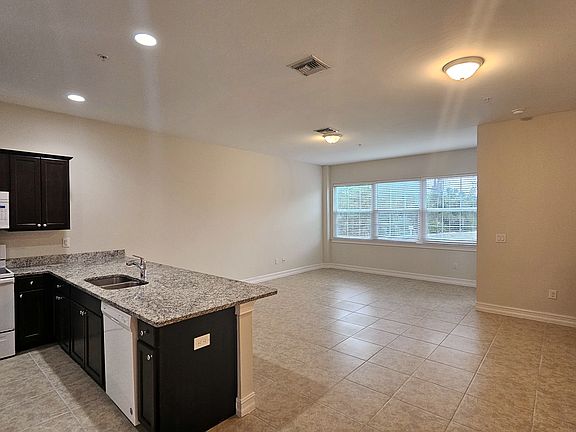 5th image of 7135 Greenwood Park Cir APT 105