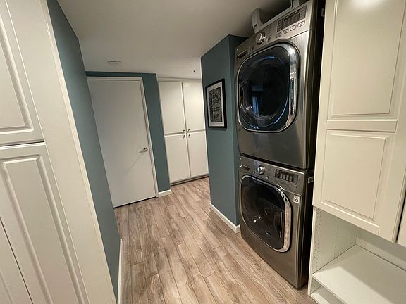 Entryway, with stacked washer & dryer
