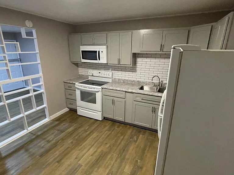 Kitchen, looking back into living room