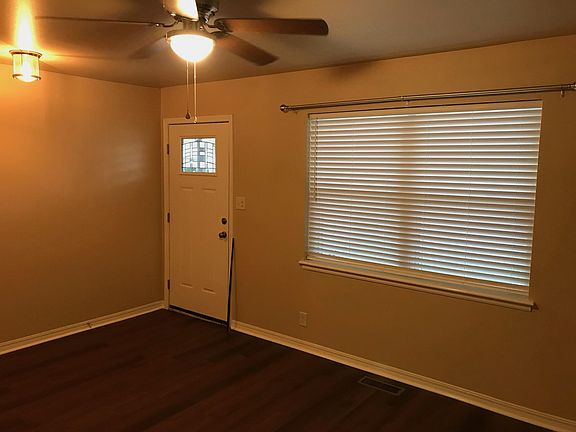 Living room area, looking toward front door.