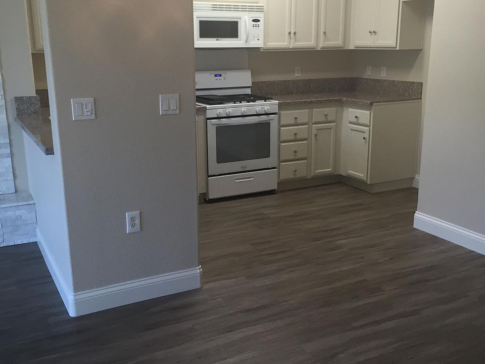 VIEW FROM SMALL DINING ROOM INTO KITCHEN