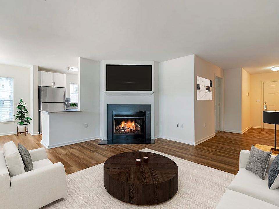 Renovated Package II living area with hard surface plank flooring