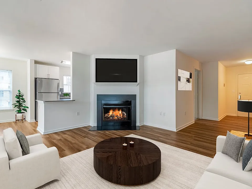 Renovated Package II living area with hard surface plank flooring