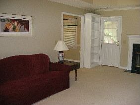 View of Family with Built-in Book Shelves