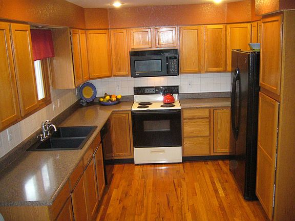 Kitchen has new countertops, sink and dishwasher