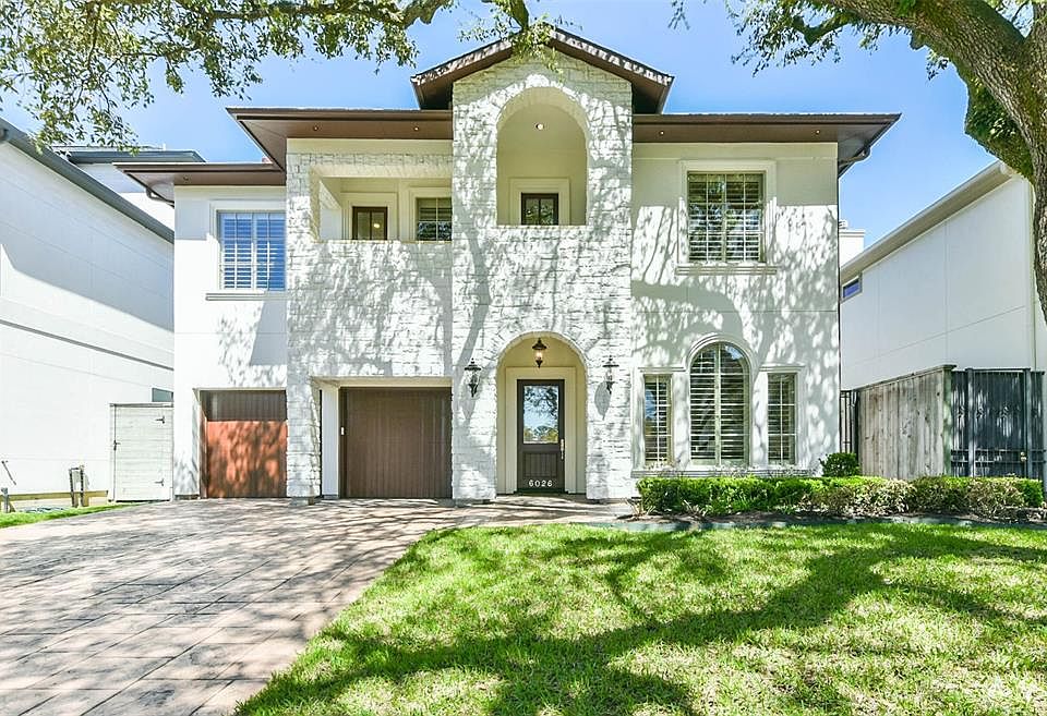 Welcome Home to stunning 6026 Floyd in desirable Glen Cove, just steps away from Memorial Park