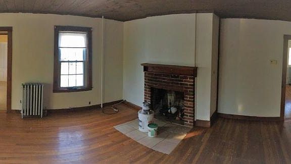 Panorama of downstairs living room and adjoining areas