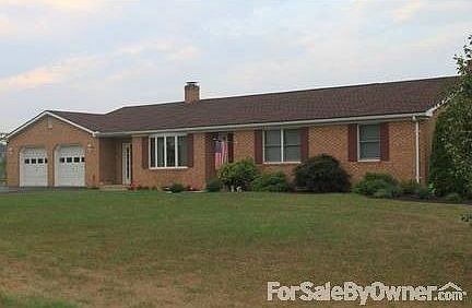 Brick Rancher w/36'D x 24'W Garage : On one acre. 3 bedroom & 3 full bath