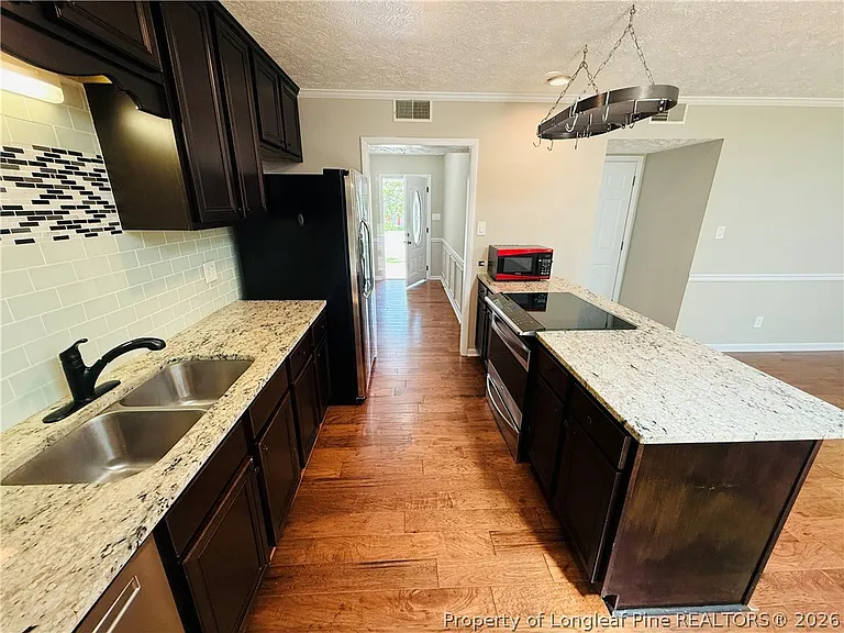 6927 Wickersham Dr — Photo 5