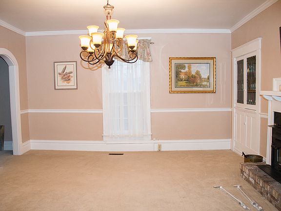 Dining room has built in dish storage and display