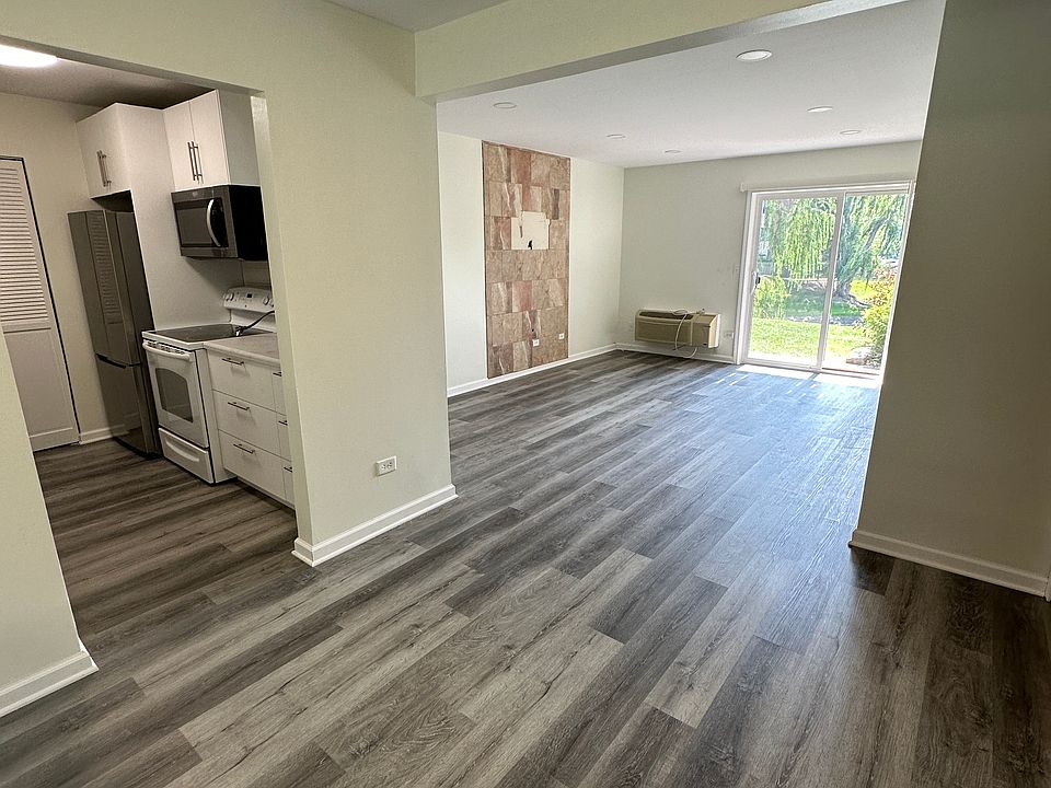 Kitchen, living room, and dining areas