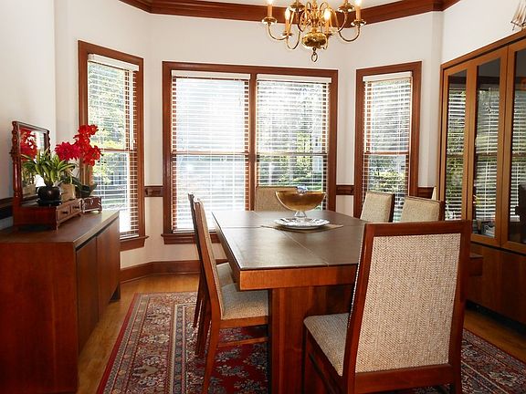 Interior View : Open Dining Room with bay windows