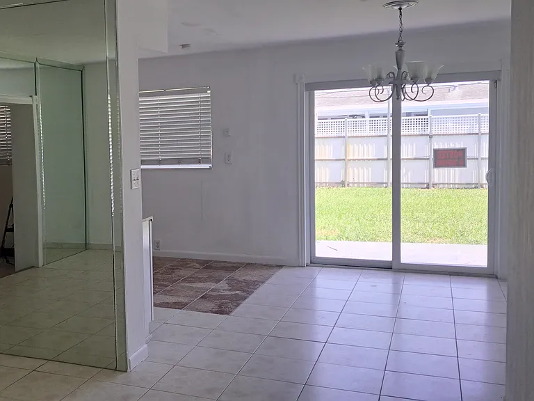 Living Room, Dining Room & Kitchen View.