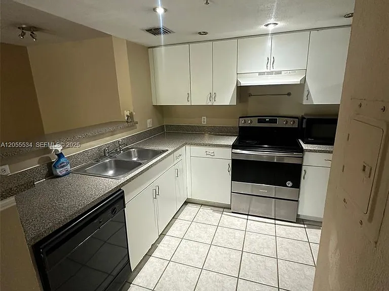 5035 Wiles Rd #203 — Photo 15