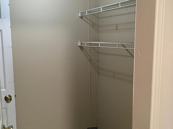 Utility room with separate pantry inside.