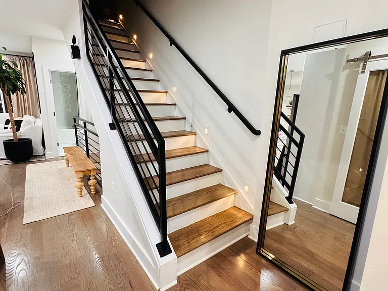 These stairs lead to the unit's private roofdeck, available only to this unit