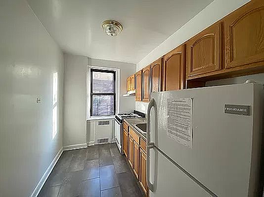 4th image of 8449 Elmhurst Ave #4J