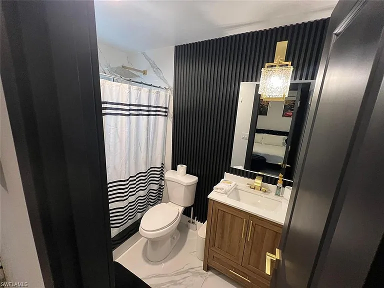 1118 NE Pine Island Ln — Photo 19
