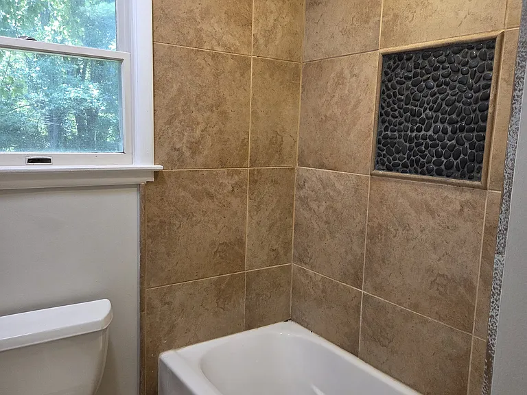 2nd bathroom has a bathtub