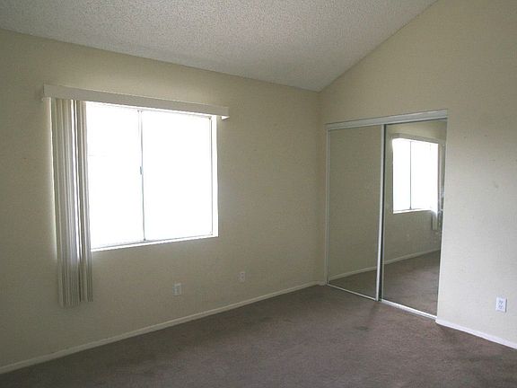 Bedroom 1 With Mirrored Closet Doors