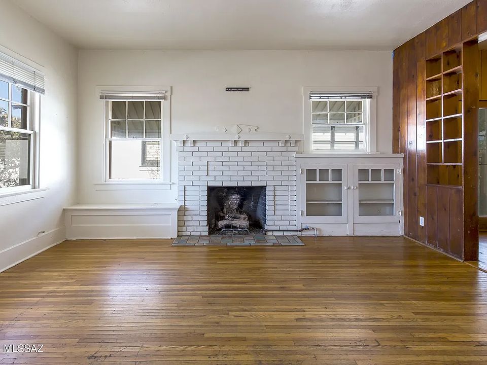 Living Room with Fireplace and built in cabinets