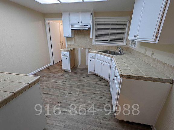Kitchen (new electric range stove/oven will be installed)