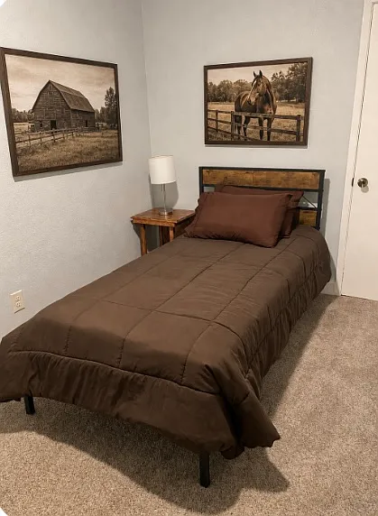 Guest bedroom with a twin-size bed.