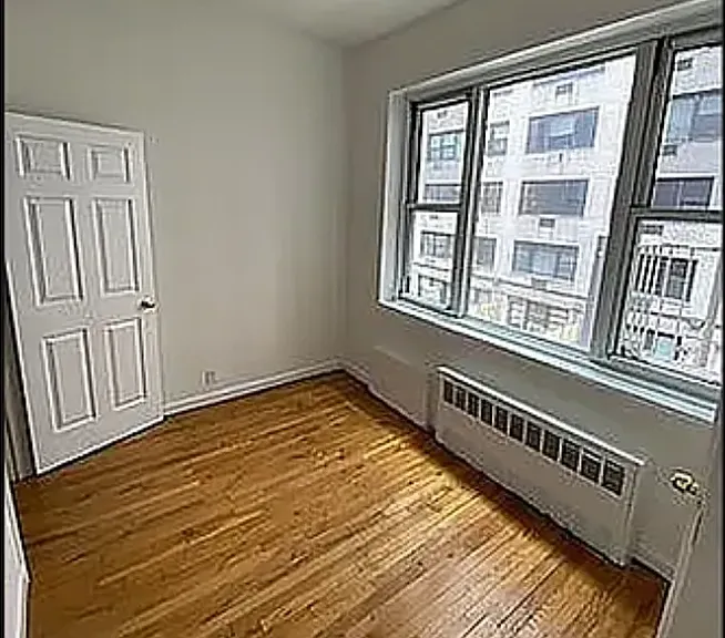 450 W 58th St #2F — Photo 1