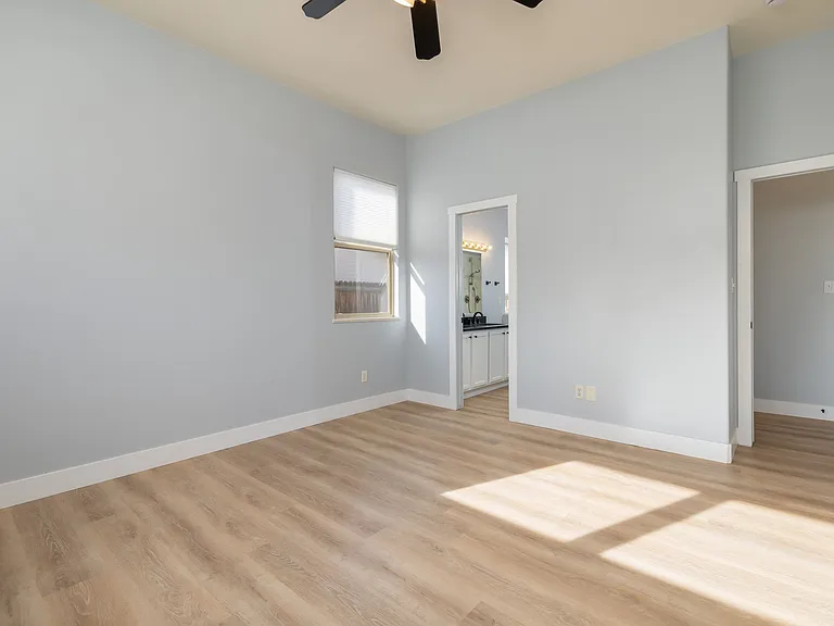 Door to bathroom on left
