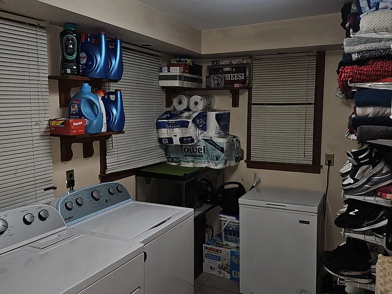 Laundry with Half Bath and lot of storage