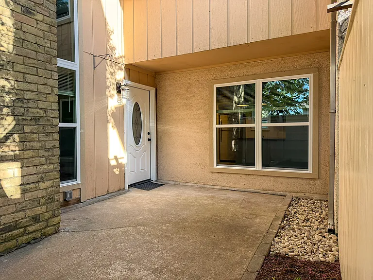 Fenced front courtyard