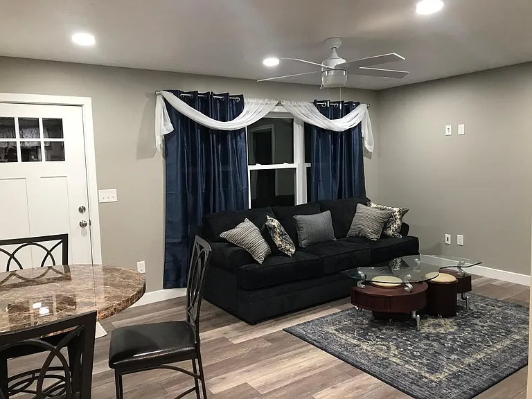 Living room and eating area. Can be rented furnished or unfurnished