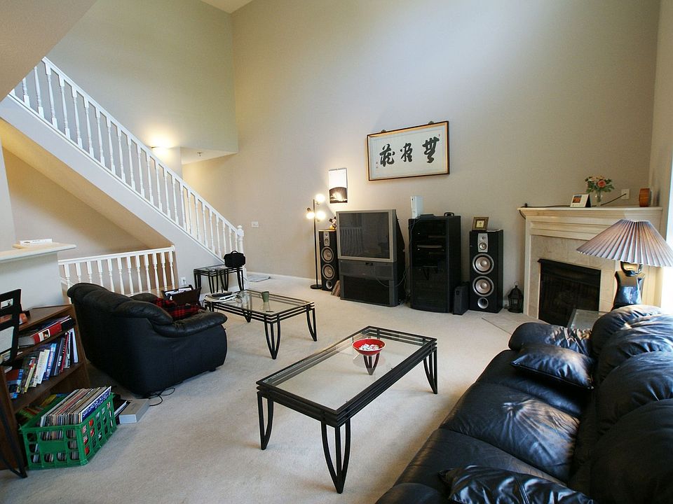 Main level great room fts gas fireplace & is open to kitchen & dining space.