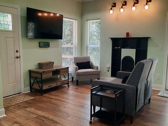 Living room looking at TV and Front door
