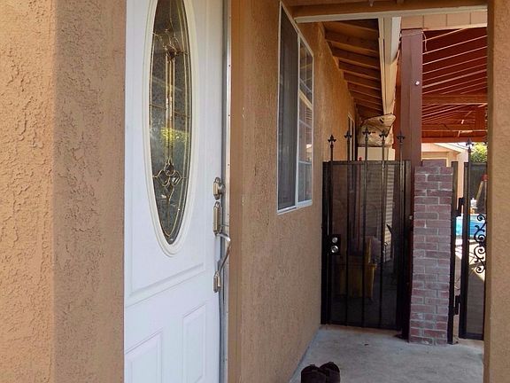 Front porch of the entrance door of first house